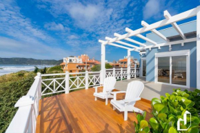 Encantadora casa com 02 suítes à beira-mar
